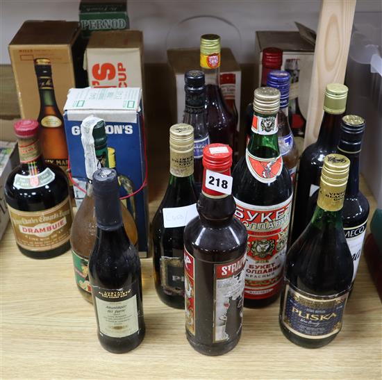 Twenty four bottles of mixed ports and spirits